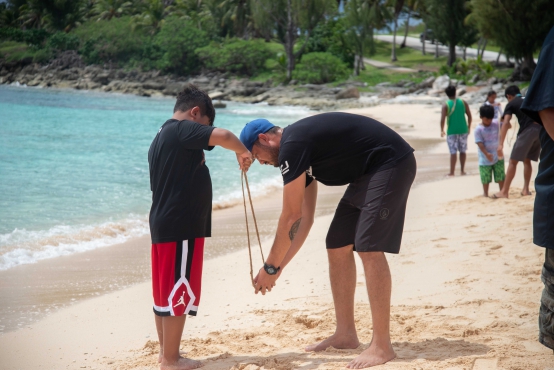Mr. Ringo from Typhoon Sports helping a camper with their sling device.