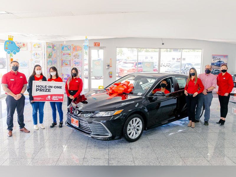 Atkins Kroll Saipan has announced that it is offering a brand new 2022 Toyota Camry as a hole-in-one prize in the upcoming 17th Annual NMC Foundation Golf Tournament. In photo is NMC President Galvin Deleon Guerrero with AK Toyota sales representatives and NMC students.