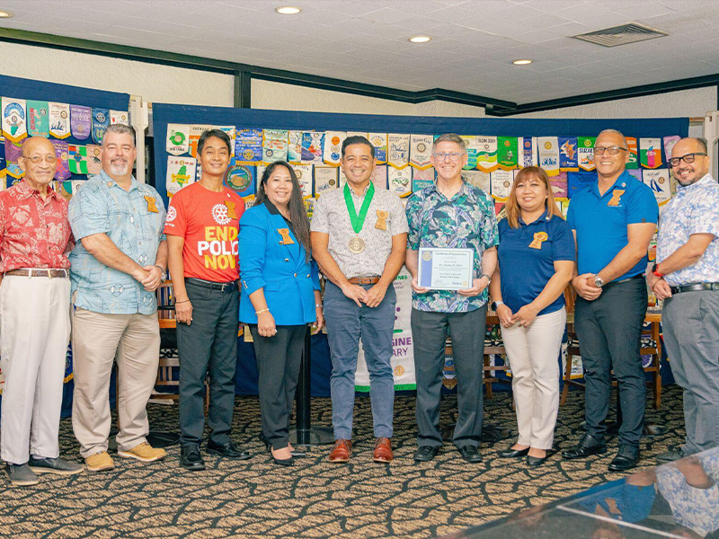Frankie Eliptico, Northern Marianas College Vice President for Administration and Advancement (center), was awarded the University of Guam’s “Milåyan Presidenten” or The President’s Medal by UOG President Dr. Thomas W. Krise at the Saipan Rotary Club’s meeting on Tuesday, August 10, 2022. In photo with Eliptico from left are Rotarians Dave Sablan and Mario Valentino, Rotary Club President Wendell Posadas, Rotarian Joann Aquino, UOG President Dr. Thomas W. Krise, Rotarian Jessy Loomis, NMC Board of Regents Chairperson and Rotarian Charles V. Cepeda, and NMC President Galvin Deleon Guerrero, EdD.